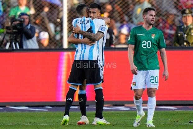 Argentina's Nicolas Gonzalez embraces teammate Exequiel Palacios