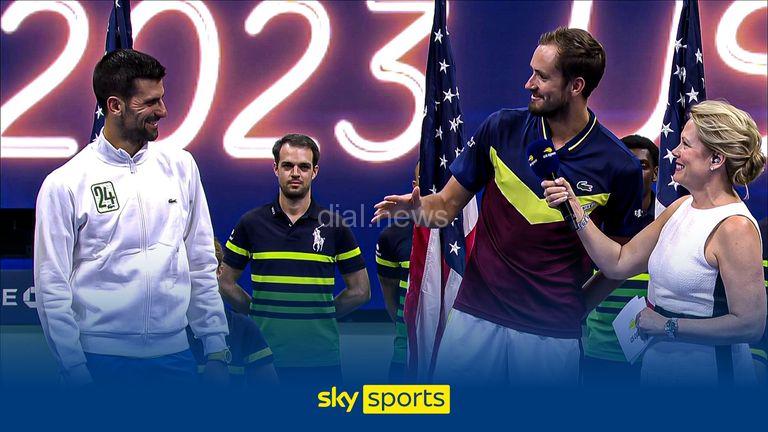 Daniil Medvedev talks to Novak Djokovic after the US Open final