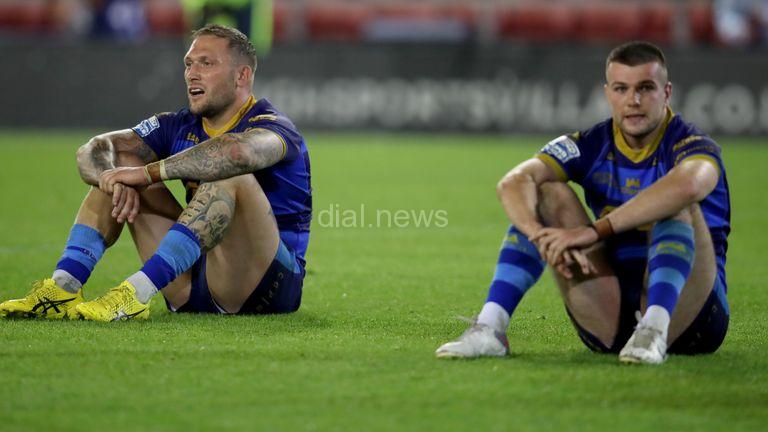 Josh Griffin (left) and Max Jowitt look dejected as Wakefield Trinity's relegation is confirmed